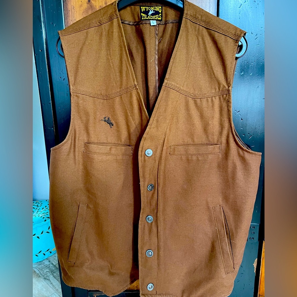 Wyoming traders Texas concealed carry vest size large color cinnamon.